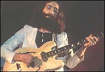 John Lennon on stage in Toronto, Canada, in a live concert that would later become his Live Peace In Toronto album.