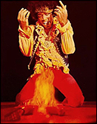 Jimi Hendrix burning his guitar during one of his concerts.